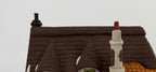 Department 56 Dickens' Village Maylie Cottage #5553-0, Oliver Twist — detail: thatched roof, orange tiled section, and chimneys