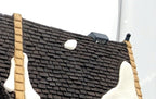 Department 56 Dickens' Village Butter Tub Barn #58338 – detail: dark shingle roof with snow patches