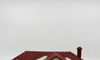 Department 56 New England Village Weston Train Station #5931-5 — detail: red shingle roof with snow patches