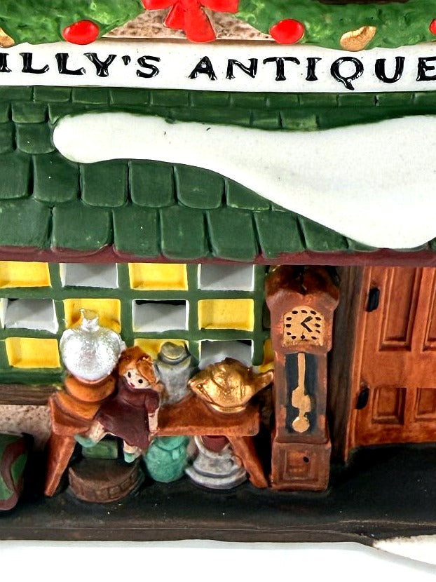 Detail - shopfront window, grandfather clock and antiques table
