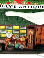 Detail - shopfront window, grandfather clock and antiques table