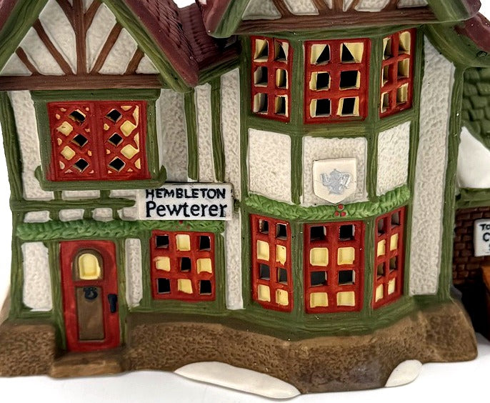 Department 56 Dickens' Village Hembleton Pewterer 1992 #5800-9 – detail of the Hembleton Pewterer sign, two-story bay windows, teapot plaque and front door