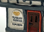 Department 56 Tutbury Printer, Dickens' Village, 1990 – detail: painted Tutbury Printer RM 1810 sign and front door