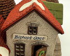 Detail of the Bishops Oast sign, upper window and front door with Christmas wreath
