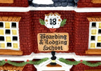 Department 56 Dickens' Village Boarding & Lodging School 1993 #5809-2 – 150th Anniversary of A Christmas Carol Commemorative Edition, No. 18 – detail of the No. 18 plaque and the Boarding & Lodging School sign above the front door