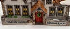 Close-up - Wackford Squeers and Boarding School signs and the wreath door (detail crop)
