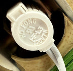 Close-up of the C7 socket cap marked HO FONG HF-L3 120V