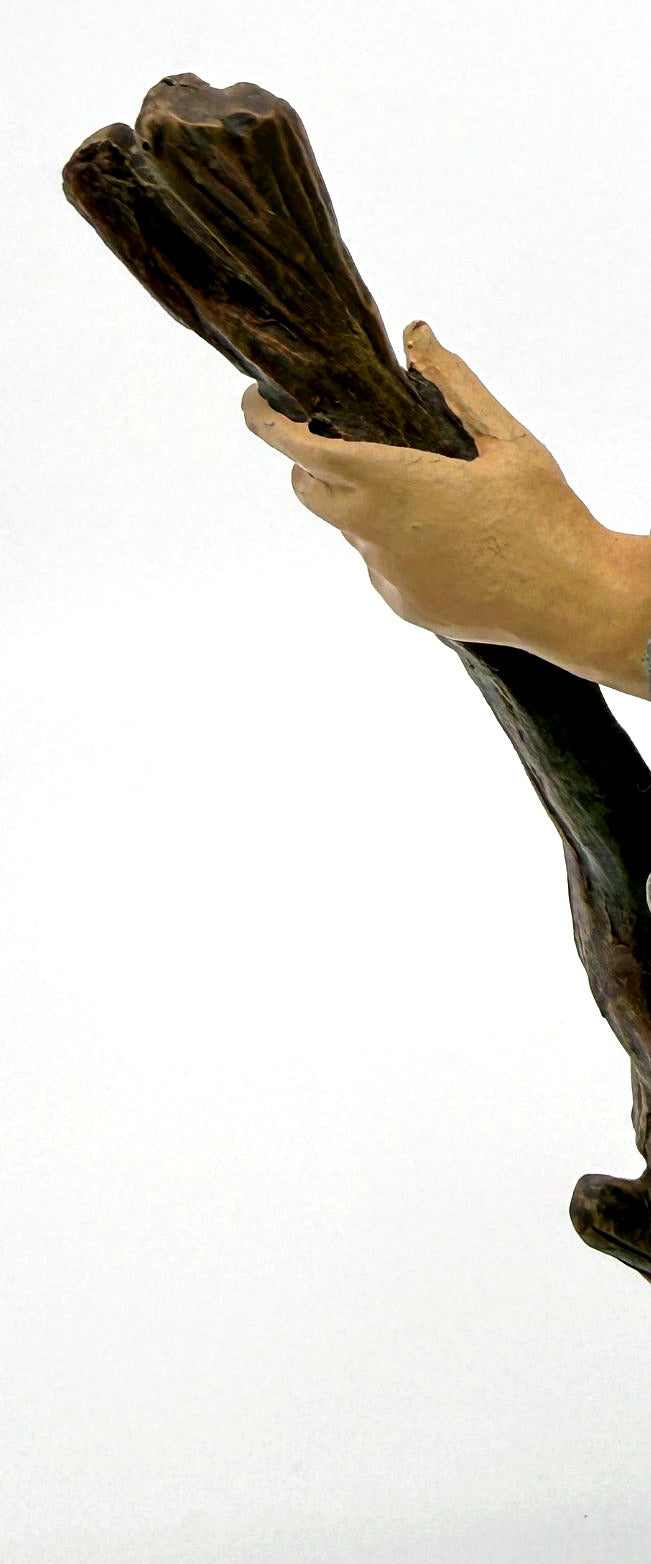 Detail: twisted wooden staff gripped in hand (detail from seller photo)