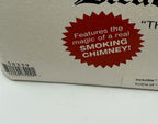 Department 56 Dickens' Village The Christmas Carol Cottage #58339 — detail: the box print, 'Features the magic of a real SMOKING CHIMNEY!'
