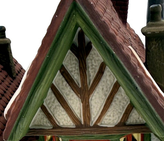Department 56 Dickens' Village Hembleton Pewterer 1992 #5800-9 – detail of the Tudor tree-branch timbering in the front gable