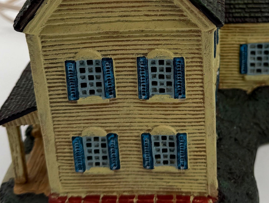 Close-up of the hand-painted shuttered windows