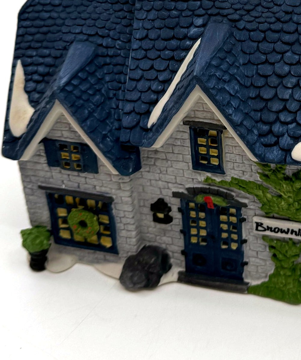 Detail crop — wreath window and dormer gables