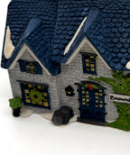 Detail crop — wreath window and dormer gables