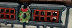 Department 56 Tutbury Printer, Dickens' Village, 1990 – detail: Christmas wreath between the upper windows