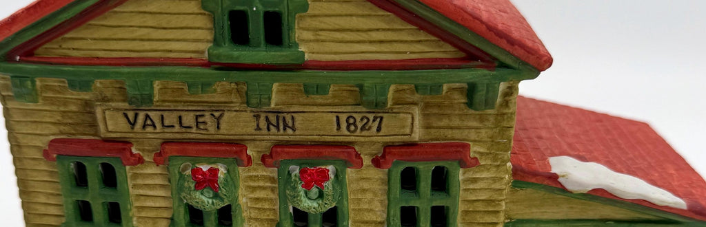 Detail - Valley Inn 1827 plaque and wreath windows
