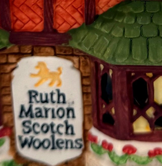 Detail - Ruth Marion Scotch Woolens sign and bay windows