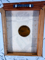 Vintage 1993 Art Deco-style fashion lady framed wall art — full back of frame showing wooden stretcher, hanging hardware and certification seal