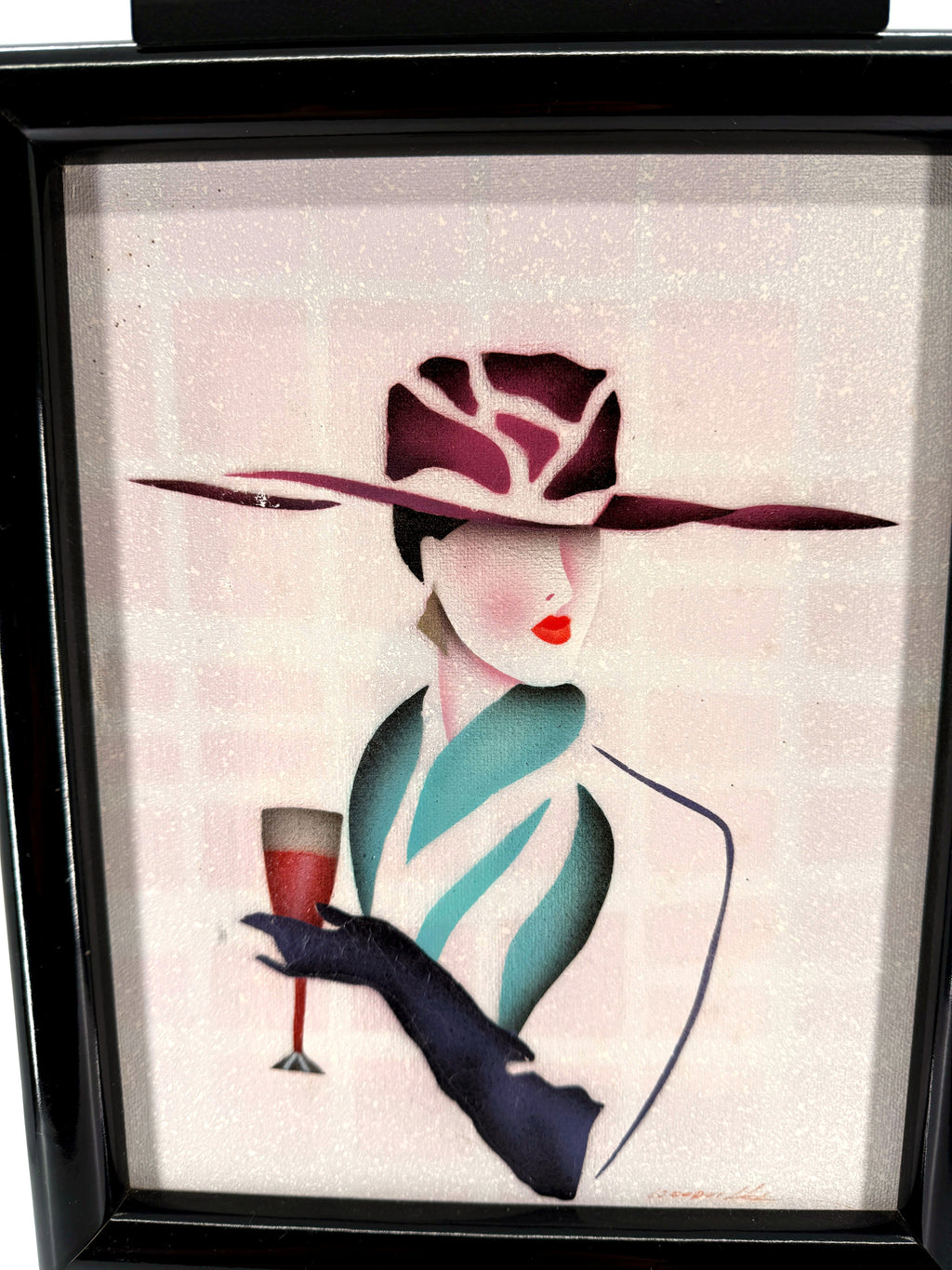 Vintage 1993 Art Deco-style fashion lady framed wall art — front detail of the hat, teal wrap and champagne glass