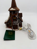 Department 56 Dickens' Village Old Michaelchurch 1992 lighted porcelain church — front three-quarter view with new replacement light cord, bulb and original booklet