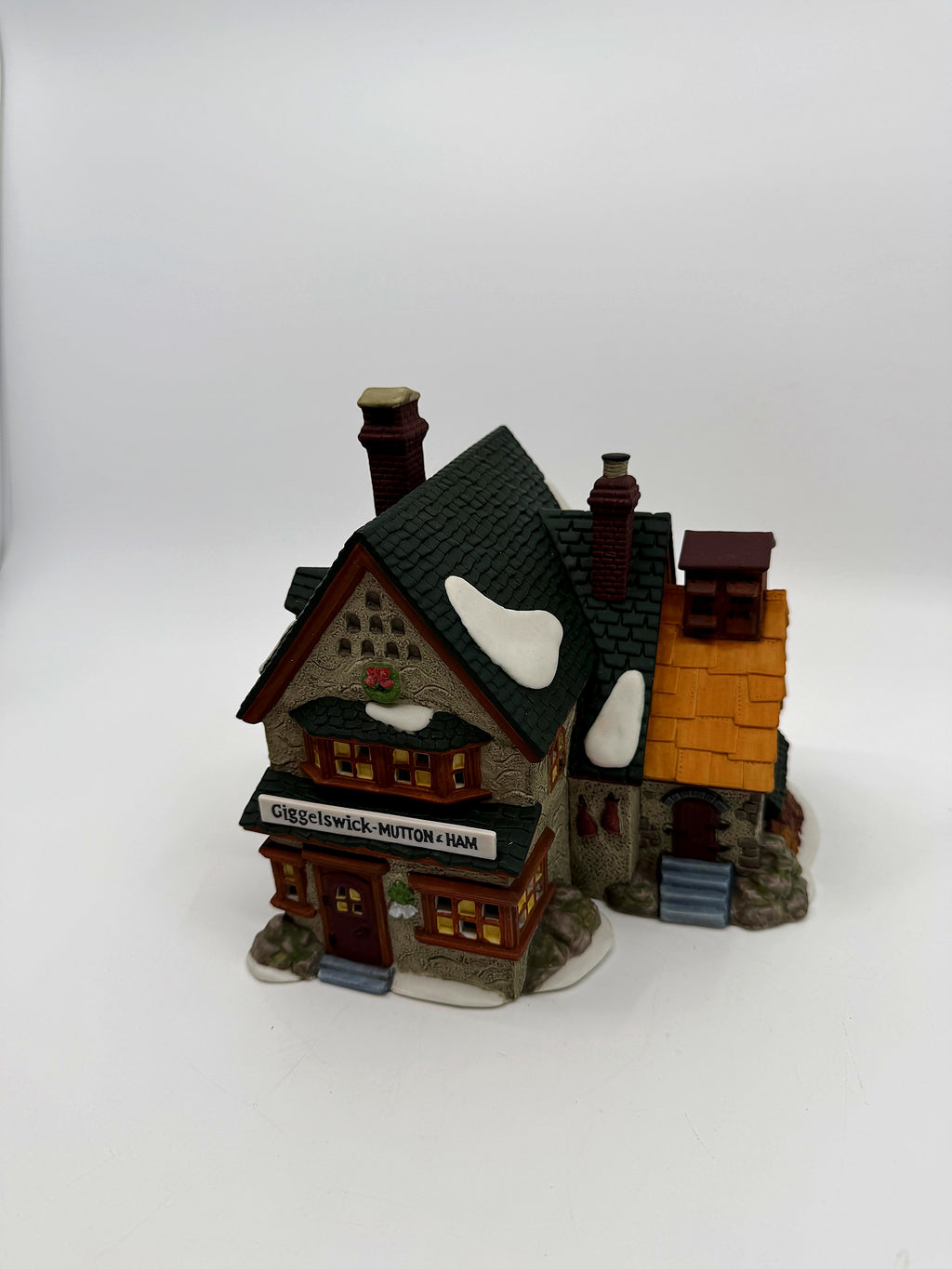 Department 56 Giggelswick Mutton & Ham lighted Dickens' Village building, front three-quarter view with shop sign