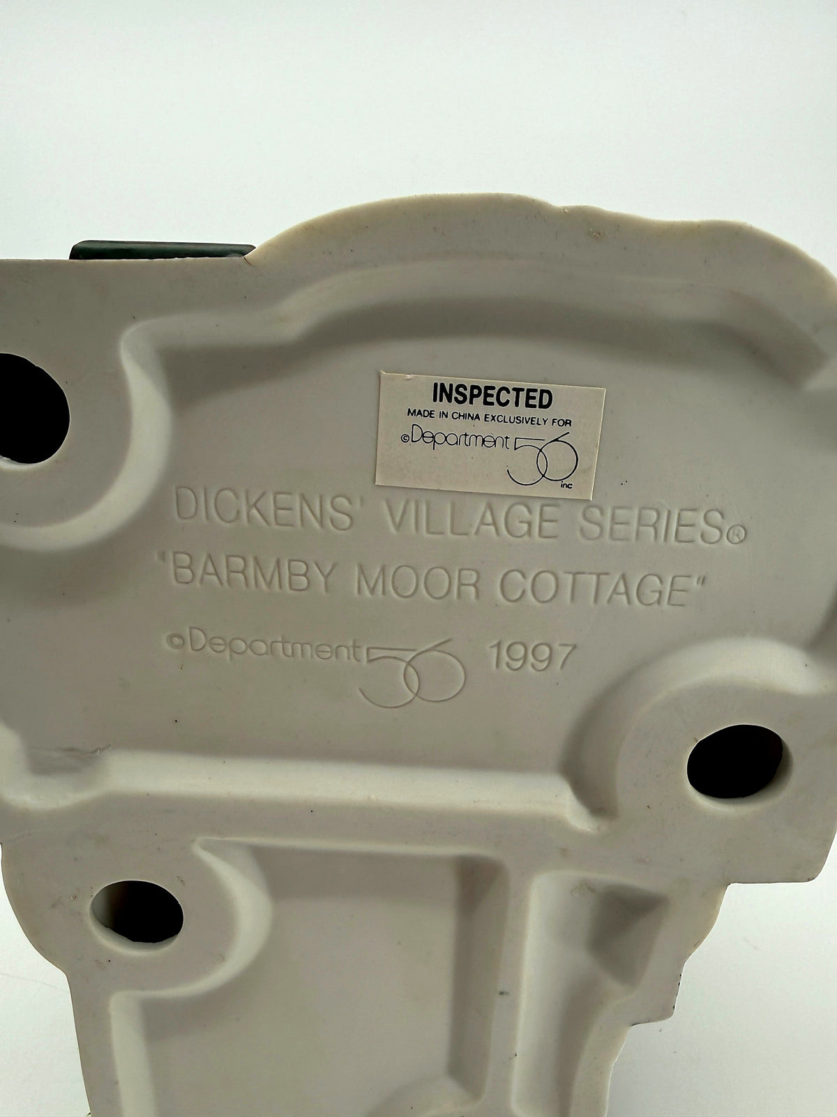 Underside stamp: Dickens' Village Series Barmby Moor Cottage, Department 56 1997, Made in China