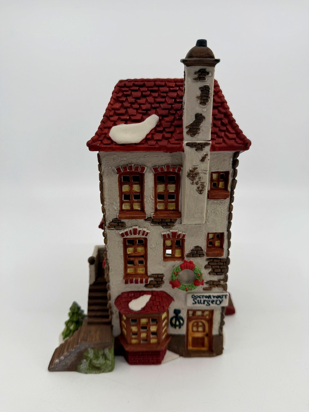 Department 56 Dickens' Village C. H. Watt Physician #5568-9 — front three-quarter view showing the surgery bay window and side stairs