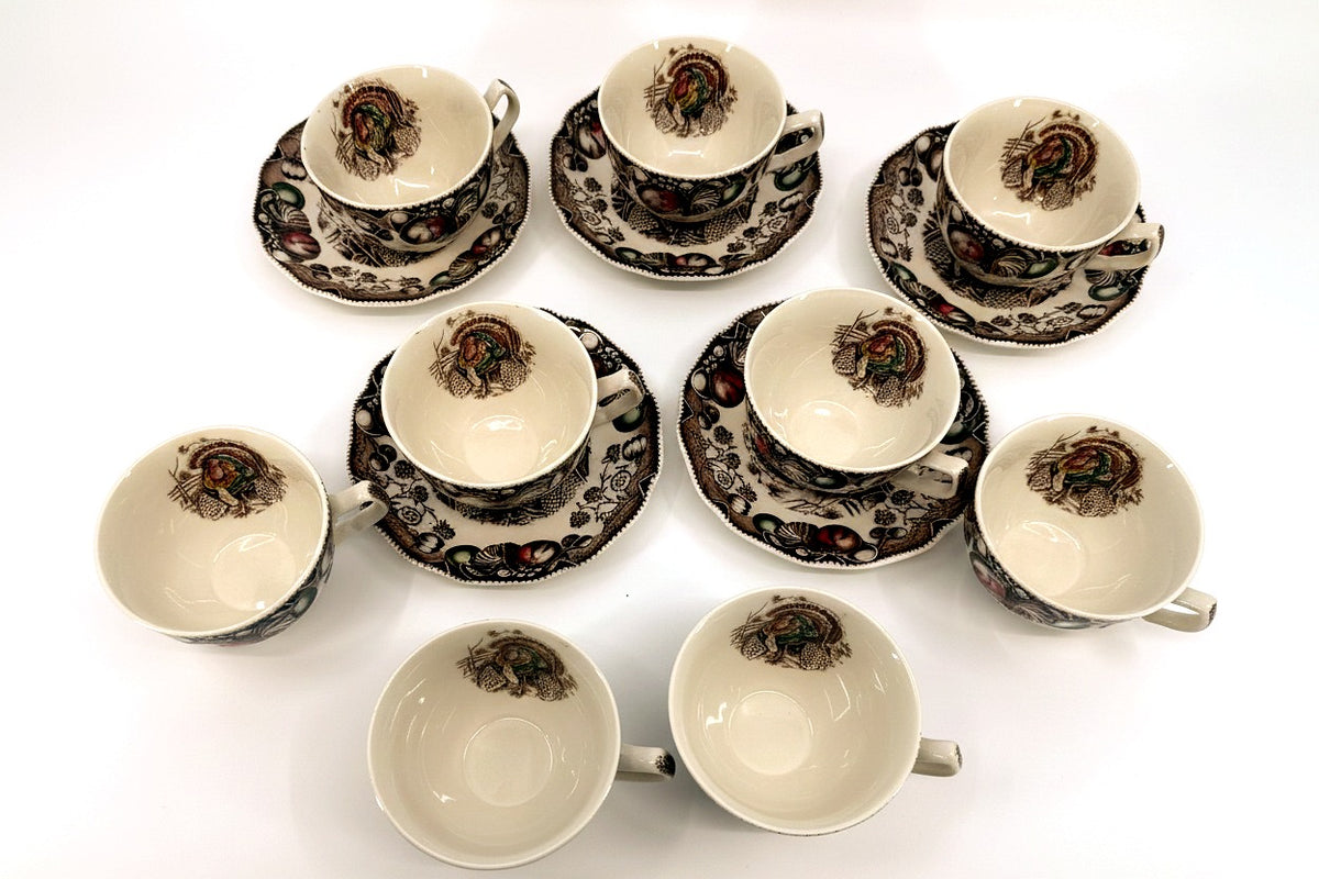 Johnson Brothers His Majesty turkey cups and saucers — the full 14-piece set, laid out