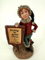 Duncan Royale History of Santa Claus Signature Piece - full view of the figure and sign from the front