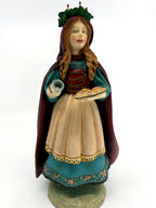 Duncan Royale St. Lucia figurine, History of Santa II, 1985 — full front view with candle crown, tray of baked goods and bell