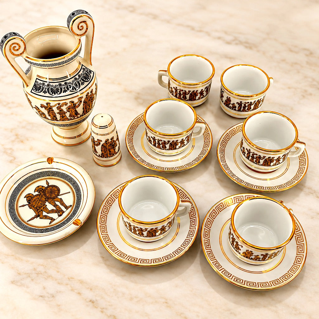 Vintage Greek ceramic coffee and decor set with vibrant gold trim on a clean editorial background