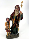 Duncan Royale Star Man figurine, History of Santa III, 1990 — full front view with the child, both holding gold ceremonial staffs