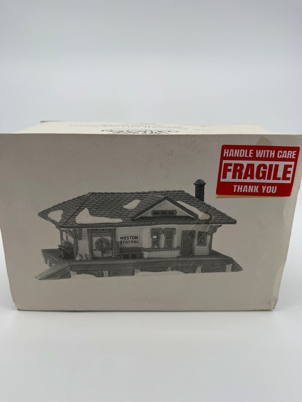 Department 56 New England Village Weston Train Station #5931-5 — original box front with the printed station illustration