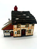 Department 56 Mr. & Mrs. Pickle Cottage - front three-quarter view
