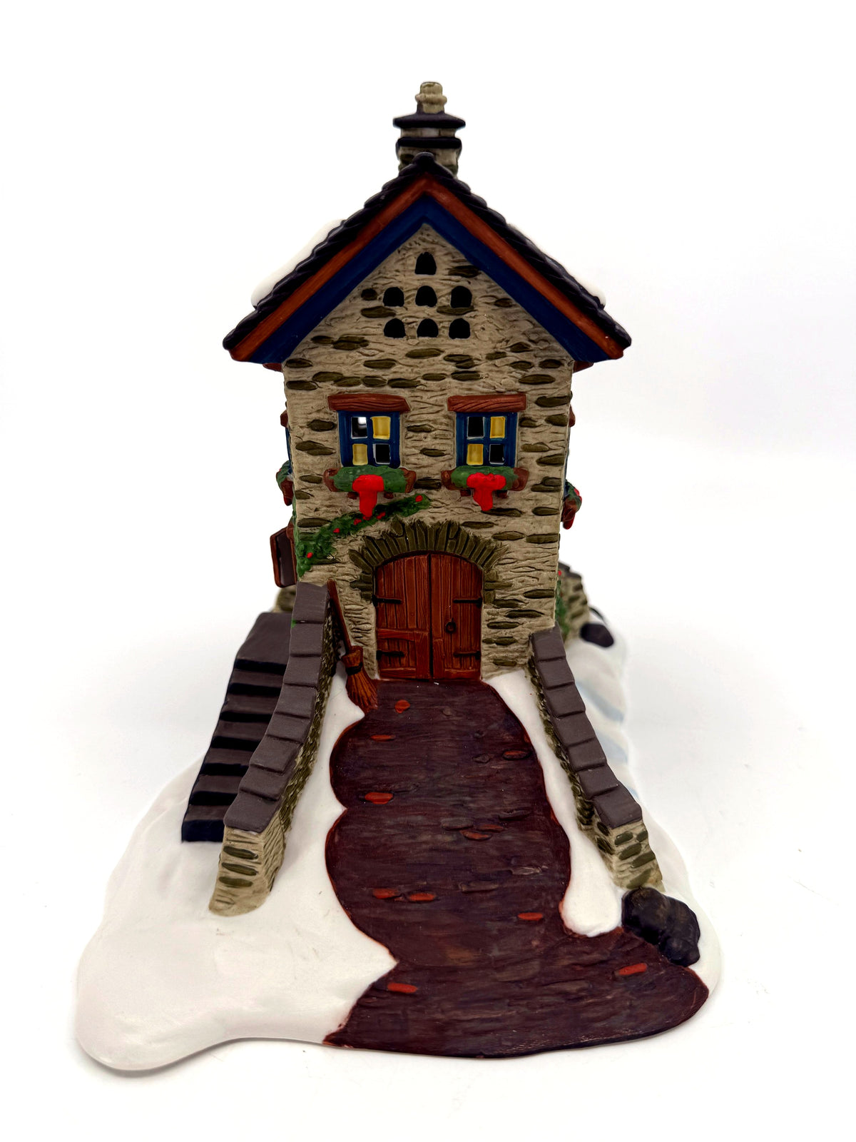 The Maltings gable end with double doors, cobbled path and broom