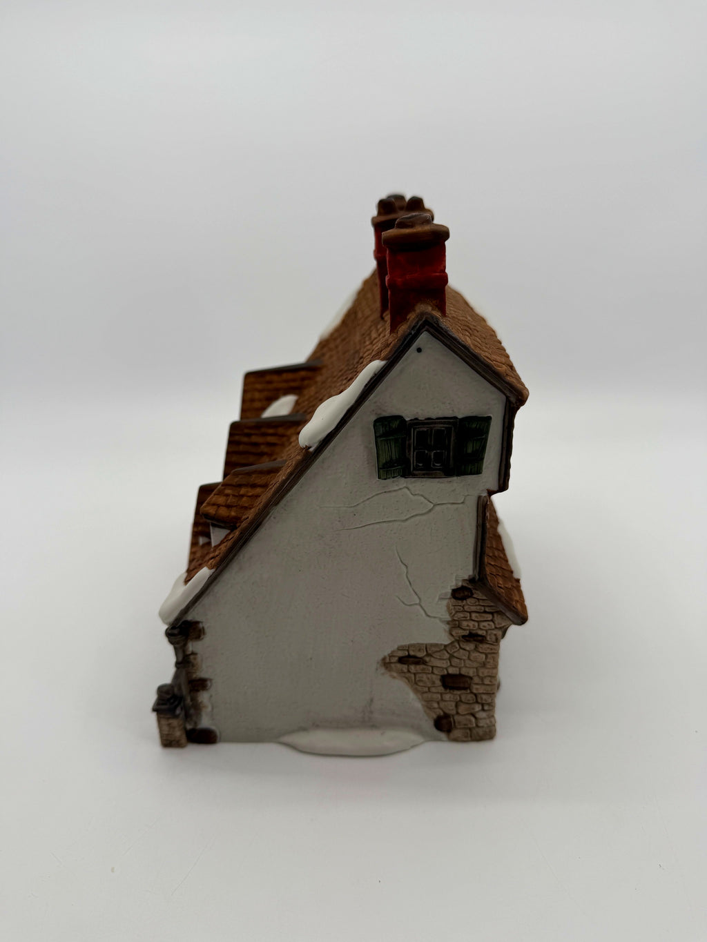 Left side - gable end with green shutters and stone detail