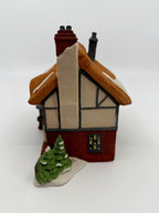 Department 56 Dickens' Village Betsy Trotwood's Cottage #5550-6, David Copperfield — gable end with half-timbered walls and brick chimney