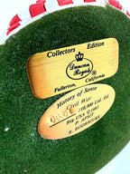 Underside of the Civil War Santa showing both Duncan Royale plaques: Collectors Edition, Fullerton California, and History of Santa - Civil War - 0931 /10,000 Ltd. Ed. - Reg. USA 1983 - P. Apsit - R. Rodrigues, on the green felt base