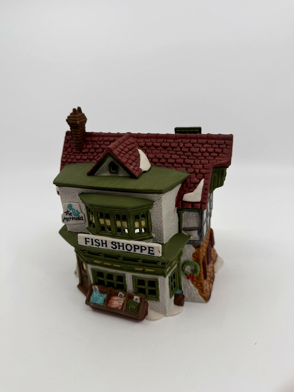 Department 56 Dickens' Village The Mermaid Fish Shoppe #5926-9 — front three-quarter view from the left