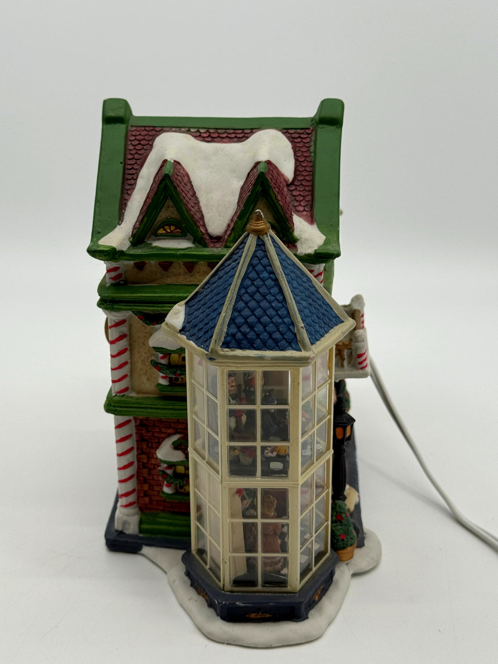 Side view of the Child's Wonder Candy Shop showing the depth of the glass bay tower and its interior figures