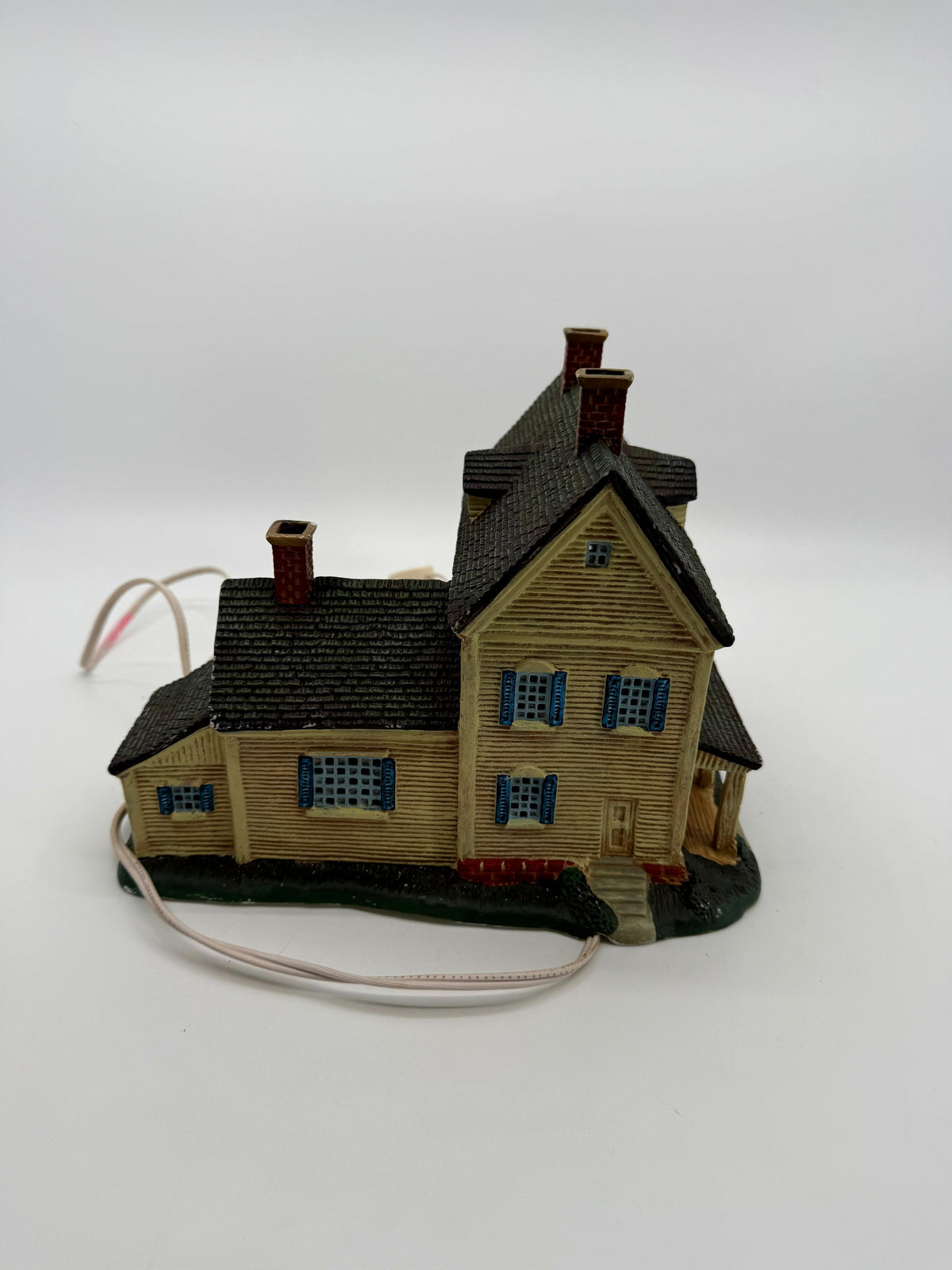 Long side view showing the L-shaped footprint and original light cord