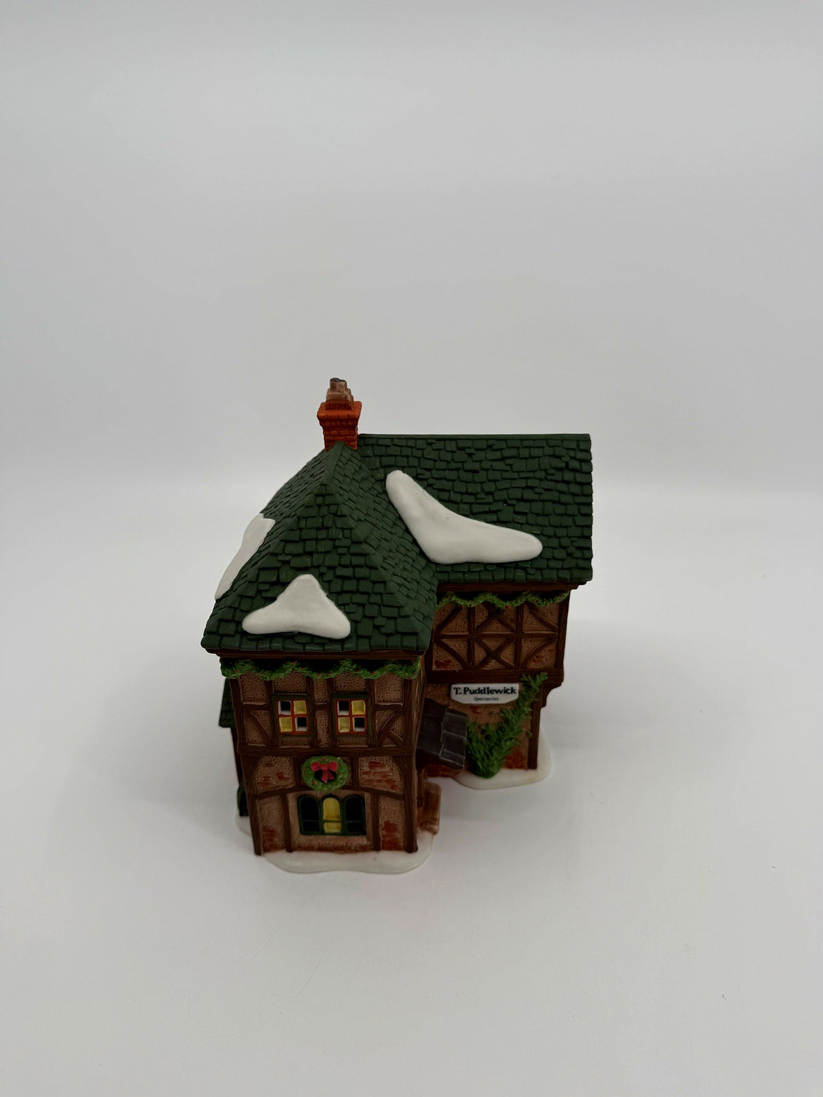 Department 56 Dickens' Village T. Puddlewick Spectacle Shop #58334 — front view