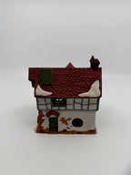 Department 56 Dickens' Village The Mermaid Fish Shoppe #5926-9 — back view showing the light cord opening