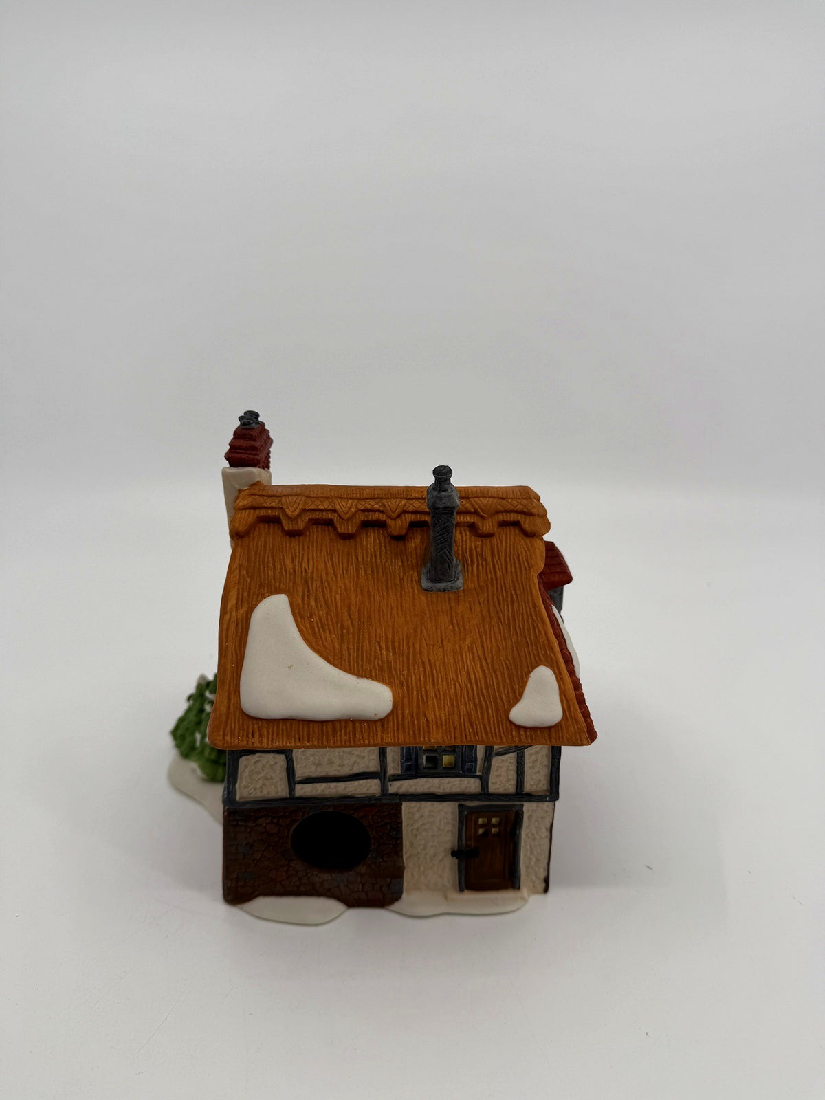 Department 56 Dickens' Village Betsy Trotwood's Cottage #5550-6, David Copperfield — back view showing the light cord opening