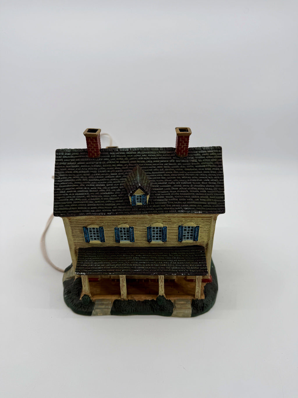Front elevation and roof from above, showing the dormer window and shingled roof