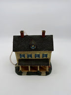 Front elevation and roof from above, showing the dormer window and shingled roof