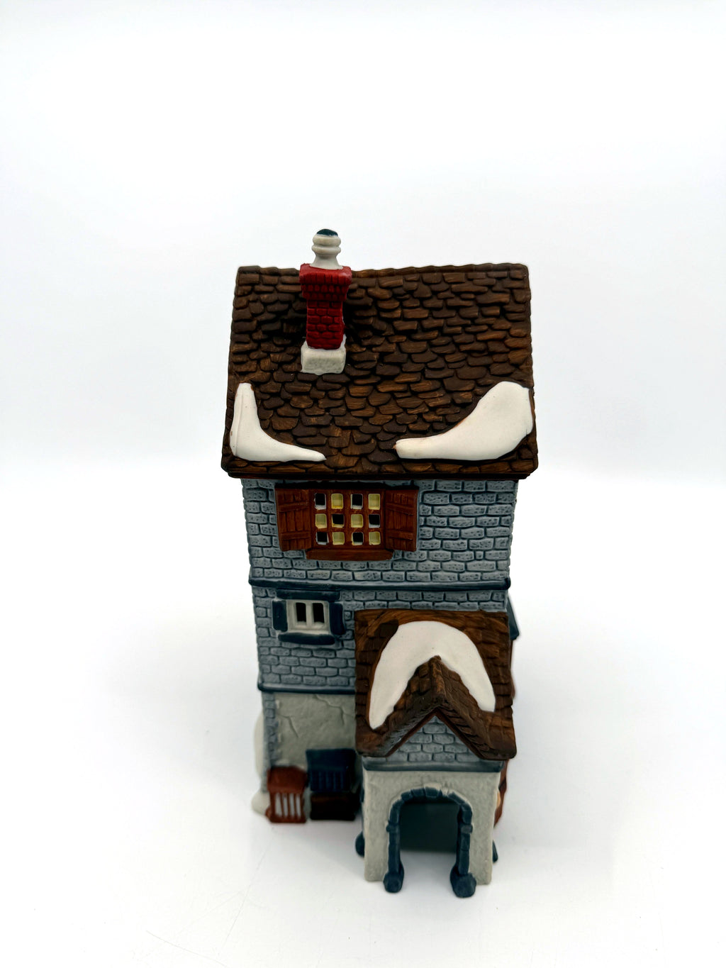 Department 56 Dickens' Village Poulterer 1988 lighted porcelain poultry shop — left side: arched doorway with hanging poultry