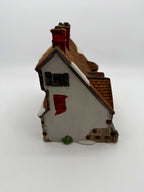 Right side - gable end with exposed brick detail