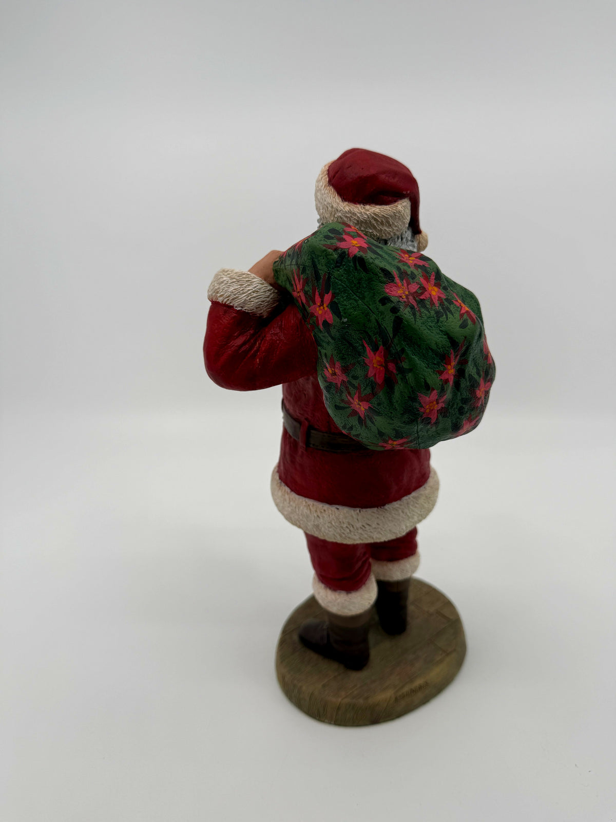 Vintage 1994 Duncan Royale Santa's Gift figurine – back view