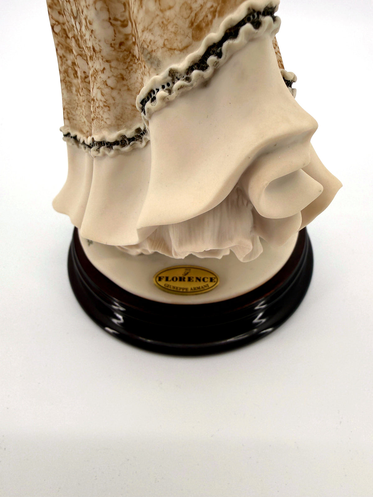 Giuseppe Armani Roses of May figurine 1405C — close-up of the gown hem and the Florence plaque on the base