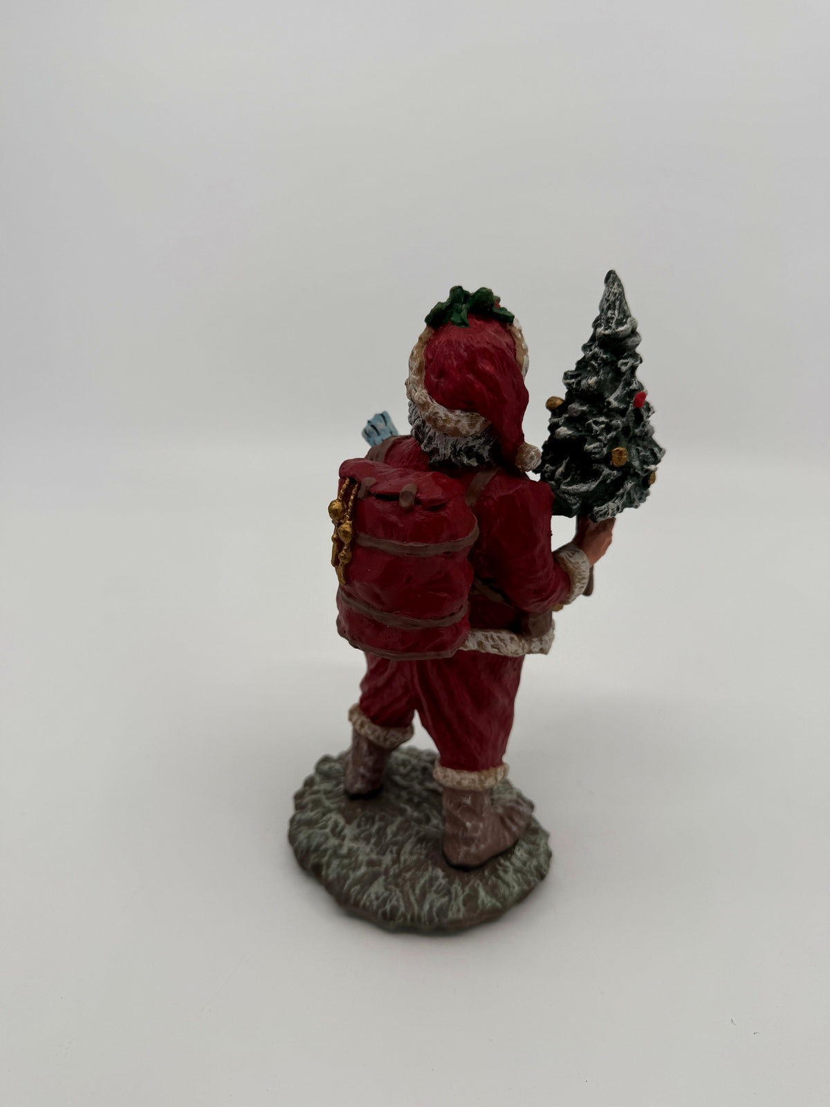 Vintage 1991 Duncan Royale Today's Nast Santa figurine – back view with the flocked Christmas tree and red toy sack